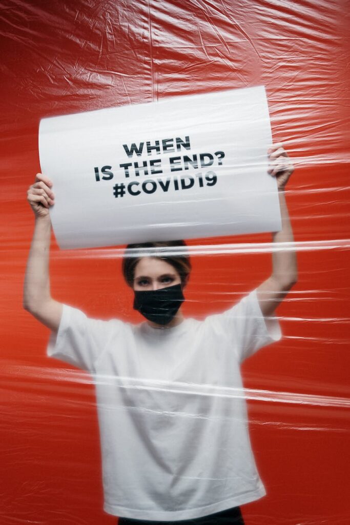 woman holding a poster with anxiety